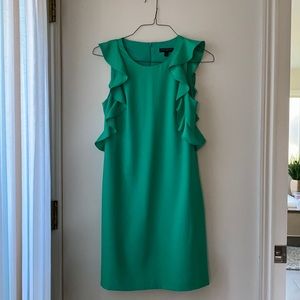 Shell dress, ruffle sleeve.